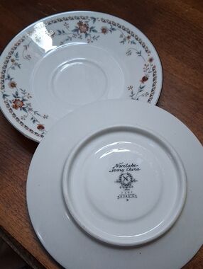 Noritake Ivory Saucer with Orange Floral and Blue Leaf Accents